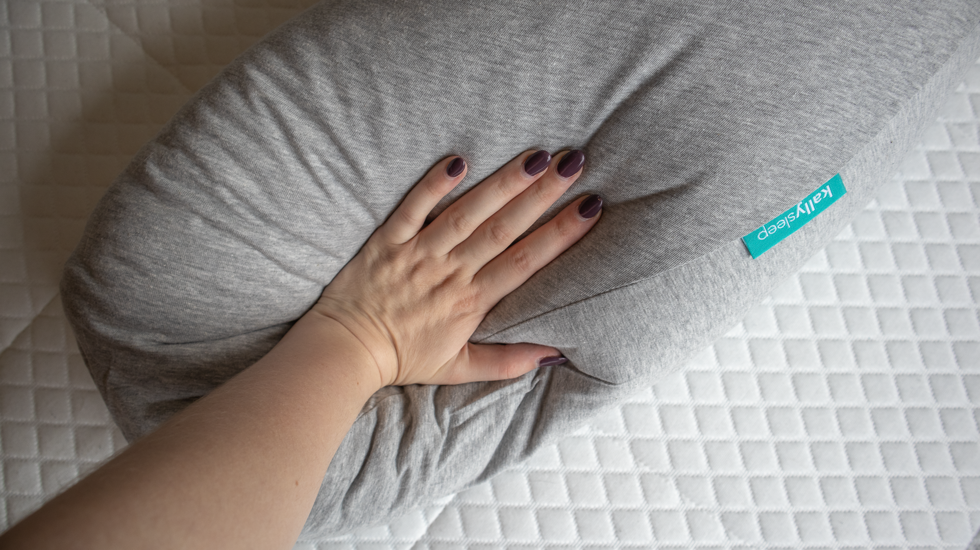 Kally Body Pillow being pressed